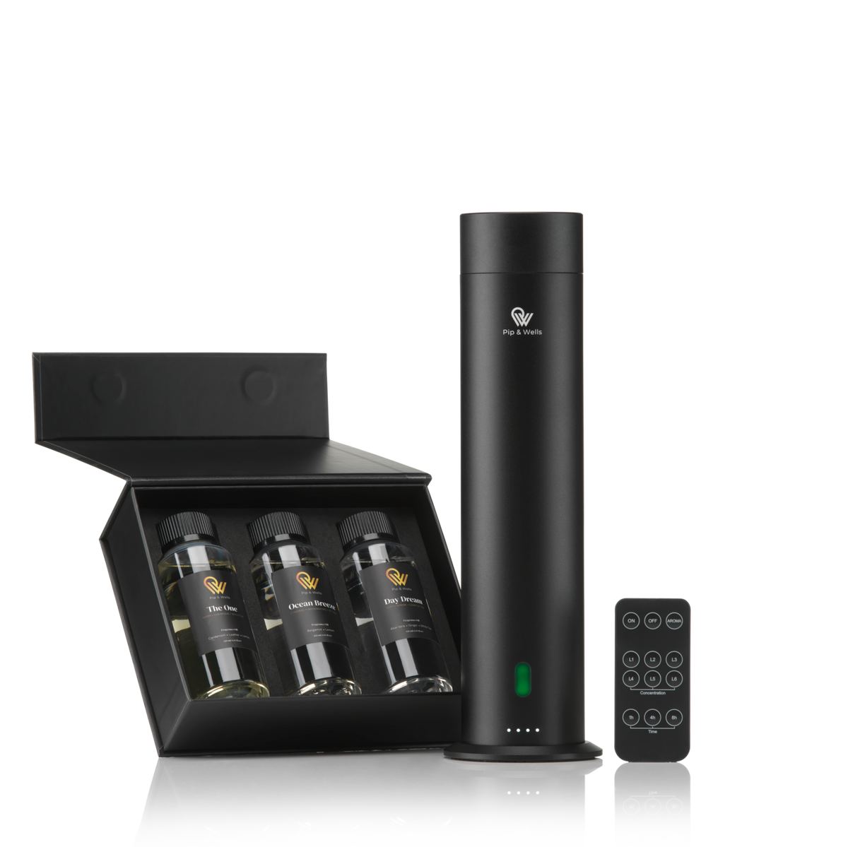 Pip & Wells Pure One matte black waterless aroma diffuser with remote control and three fragrance oils in a gift box